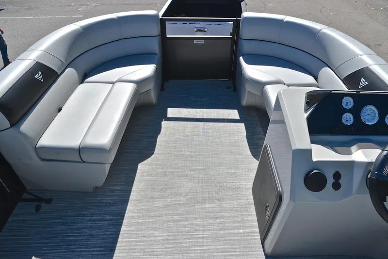 Slide: The Image of 2023 Viaggio DM18U boat interior with gray seating and modern dashboard. - 20
