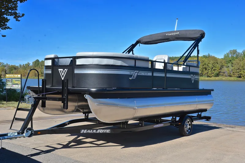 Slide: The Image of 2023 Viaggio DM18U pontoon boat on trailer by a lake. - 9