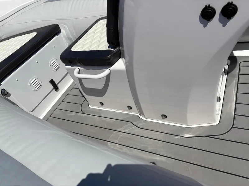 Slide: The Image of 2024 Highfield Sport 390 boat interior with sleek seating and modern design. - 24
