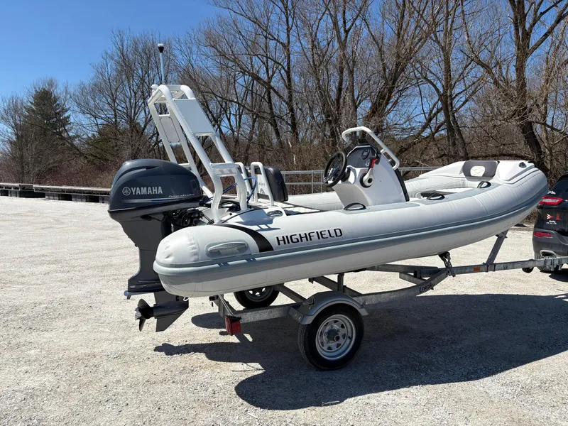 Slide: The Image of 2024 Highfield Sport 390 inflatable boat on trailer with Yamaha outboard motor. - 5