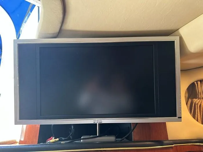 Slide: The Image of Flat-screen TV inside 2000 Sea Ray 410 Sundancer yacht cabin. - 17