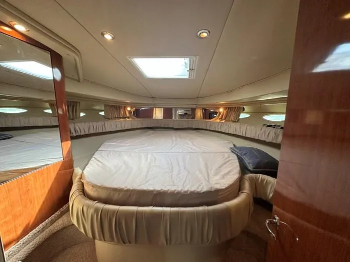 Slide: The Image of Luxurious cabin interior of 2000 Sea Ray 410 Sundancer yacht. - 18