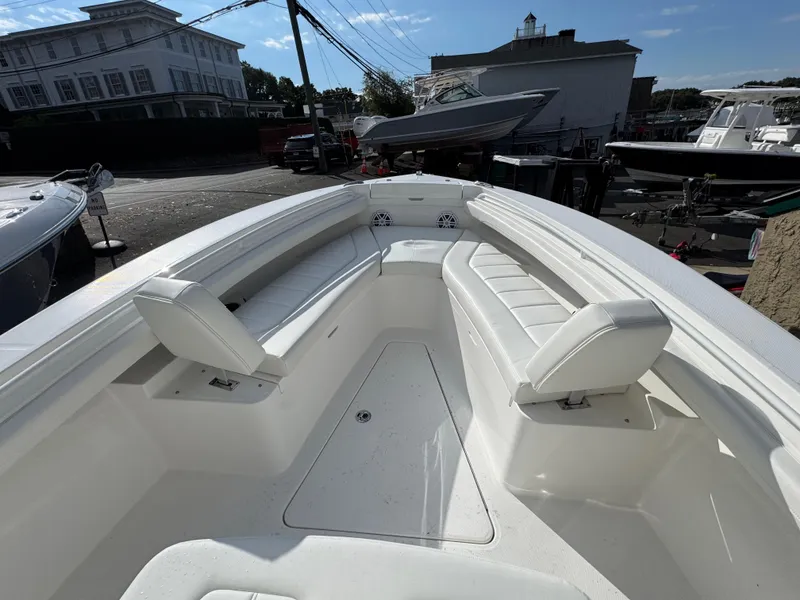 Slide: The Image of Open storage compartment on 2025 Regulator 23 boat. - 18