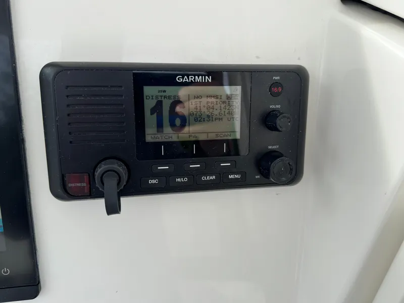 Slide: The Image of Regulator 23 boat dashboard with navigation and control panels, 2025 model. - 6