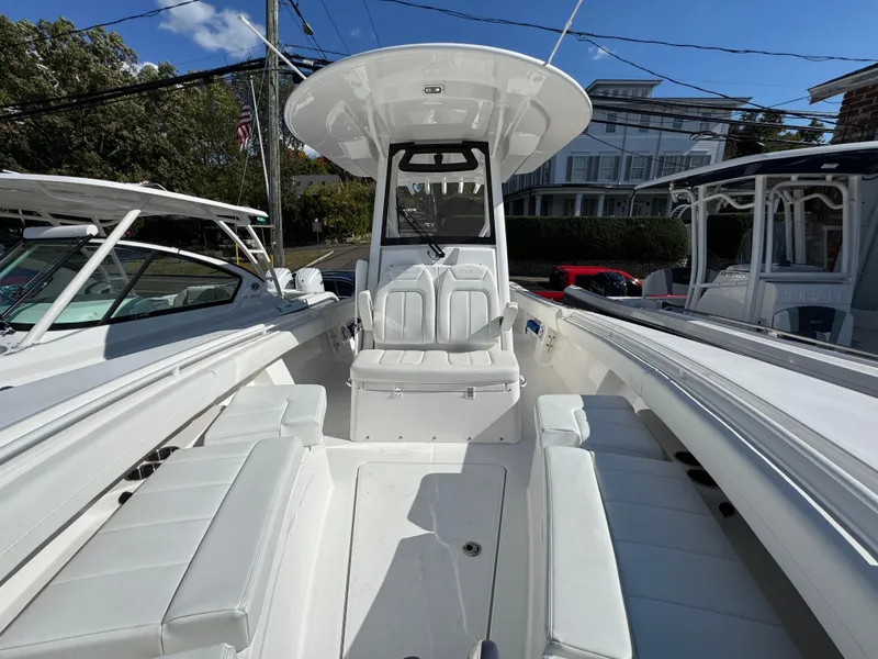 Slide: The Image of 2025 Regulator 28 boat with spacious seating and sleek design. - 14