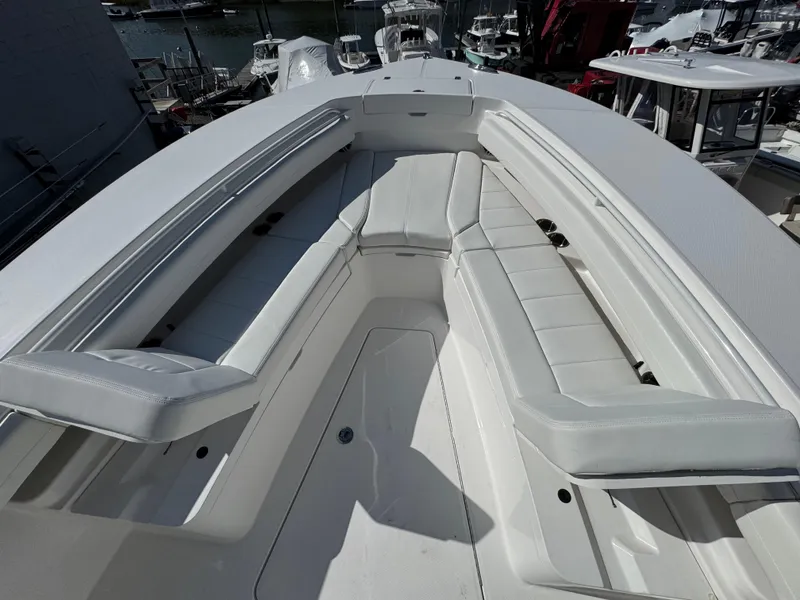 Slide: The Image of 2025 Regulator 28 boat with spacious white seating area. - 15