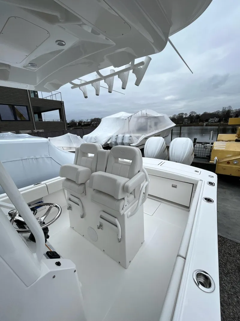 Slide: The Image of 2025 Regulator 28 boat interior with dual seats and modern design. - 25
