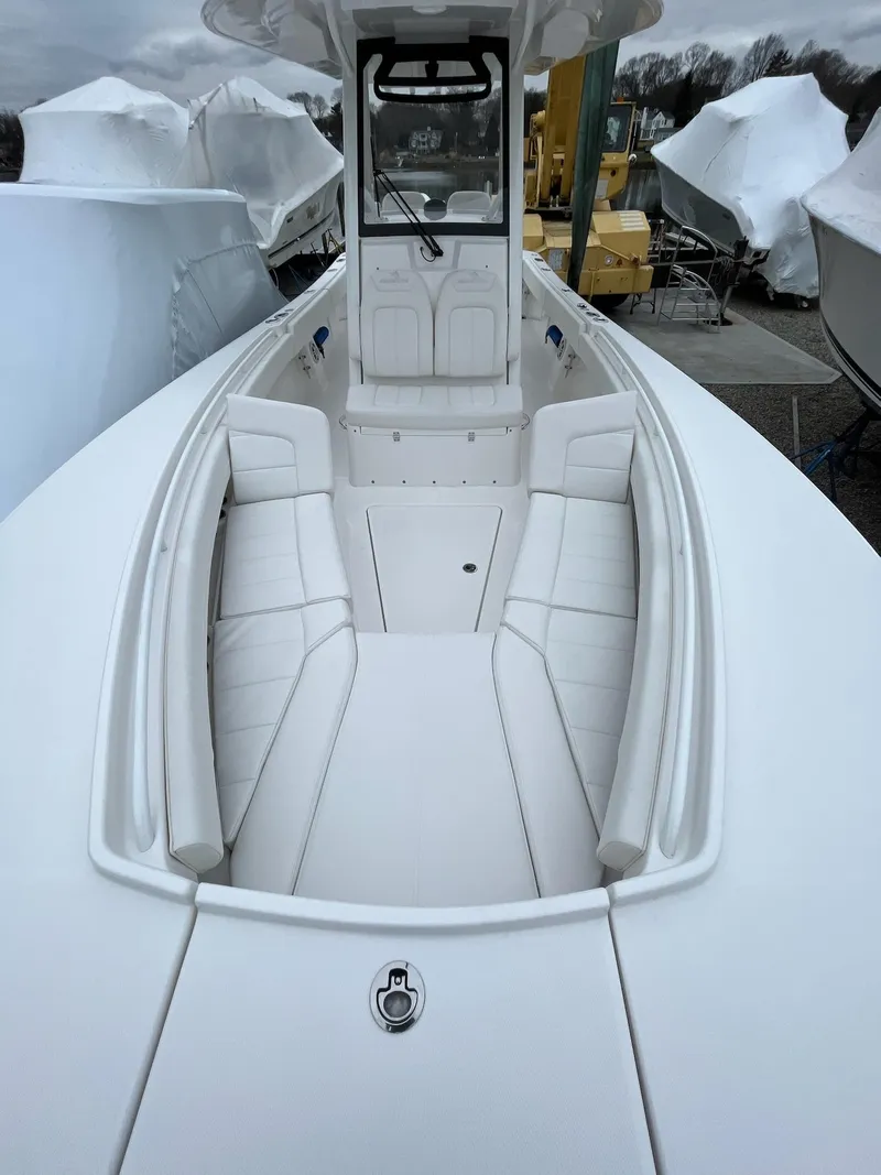 Slide: The Image of 2025 Regulator 28 boat with spacious seating and sleek design. - 33