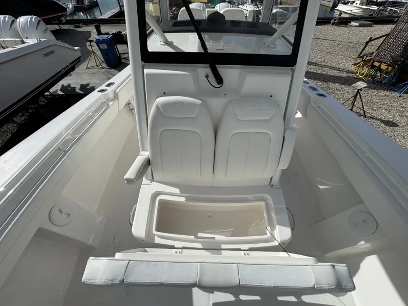 Slide: The Image of 2025 Regulator 31 boat interior with seating and storage compartment. - 20