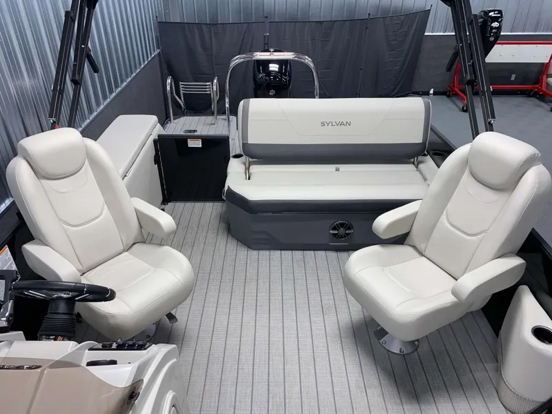 Slide: The Image of 2025 Sylvan Mirage X3 CLZ DH Tritoon interior with plush seating and modern design. - 10