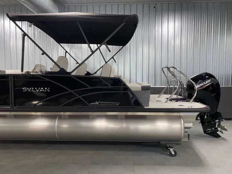 Slide: The Image of 2025 Sylvan Mirage X3 CLZ DH Tritoon with Mercury 150HP engine in showroom. - 18