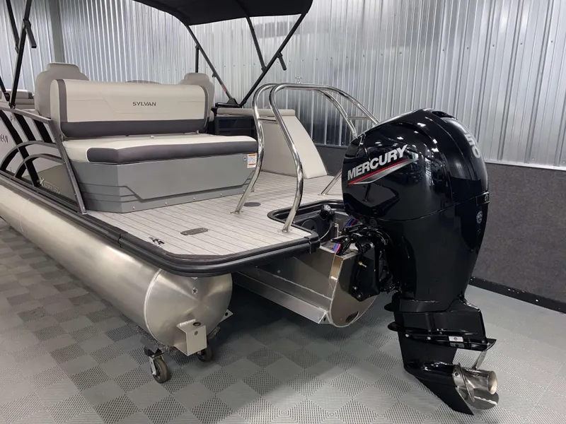 Slide: The Image of 2025 Sylvan Mirage X3 CLZ DH Tritoon with Mercury 150HP engine, rear view. - 19