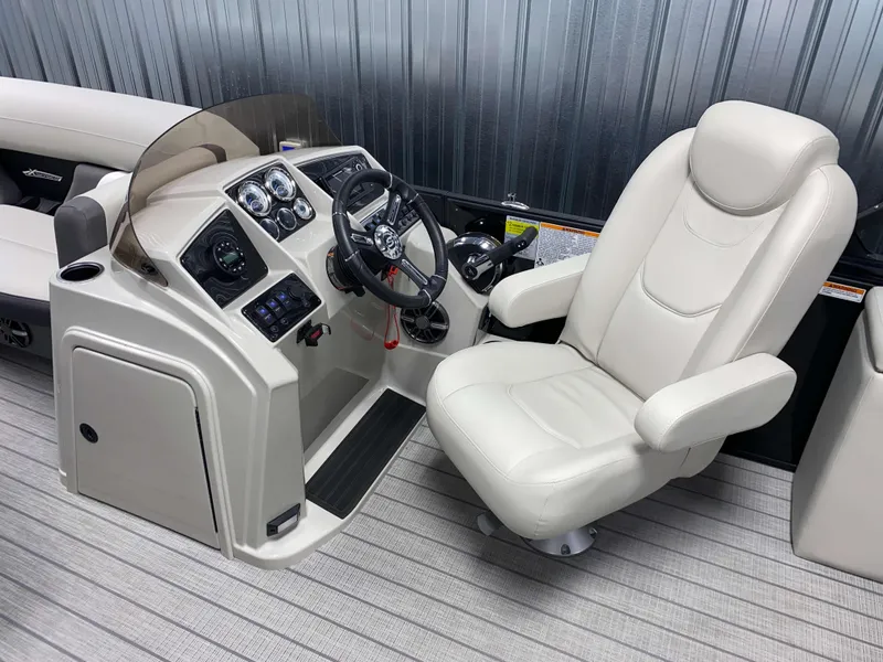 Slide: The Image of 2025 Sylvan Mirage X3 CLZ DH Tritoon helm with Mercury 150HP, featuring luxurious captain's chair. - 6