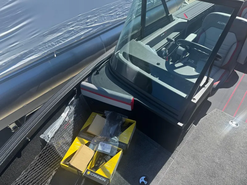 Slide: The Image of 2025 Alumacraft Trophy 185X SC Rotax S boat interior with accessories. - 5