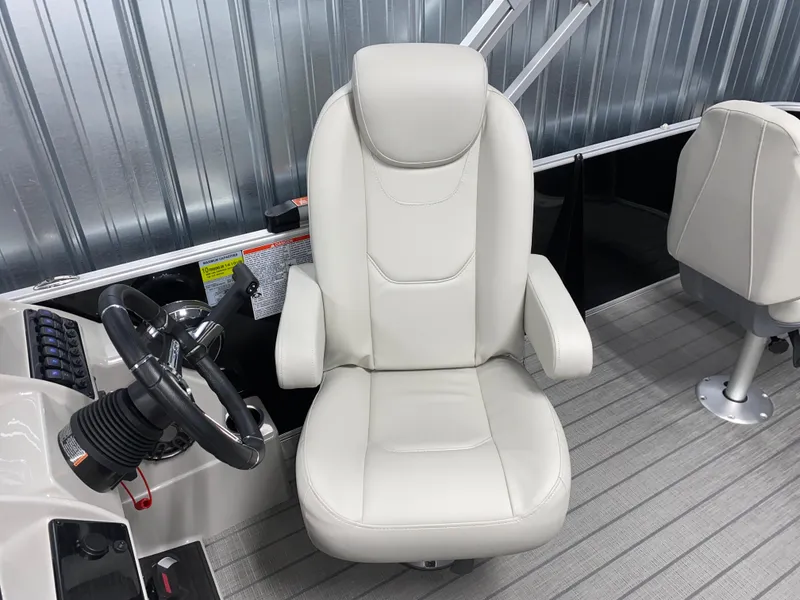 Slide: The Image of Captain's chair in 2025 Sylvan Mirage 8520 Party Fish boat, featuring Mercury 90HP engine. - 11