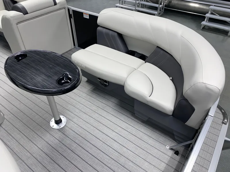Slide: The Image of 2025 Sylvan Mirage 8520 Party Fish boat interior with seating and table. - 15