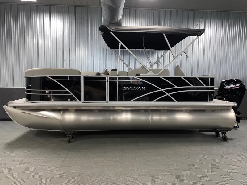 Slide: The Image of 2025 Sylvan Mirage 8520 Party Fish pontoon boat with Mercury 90HP engine in showroom. - 20