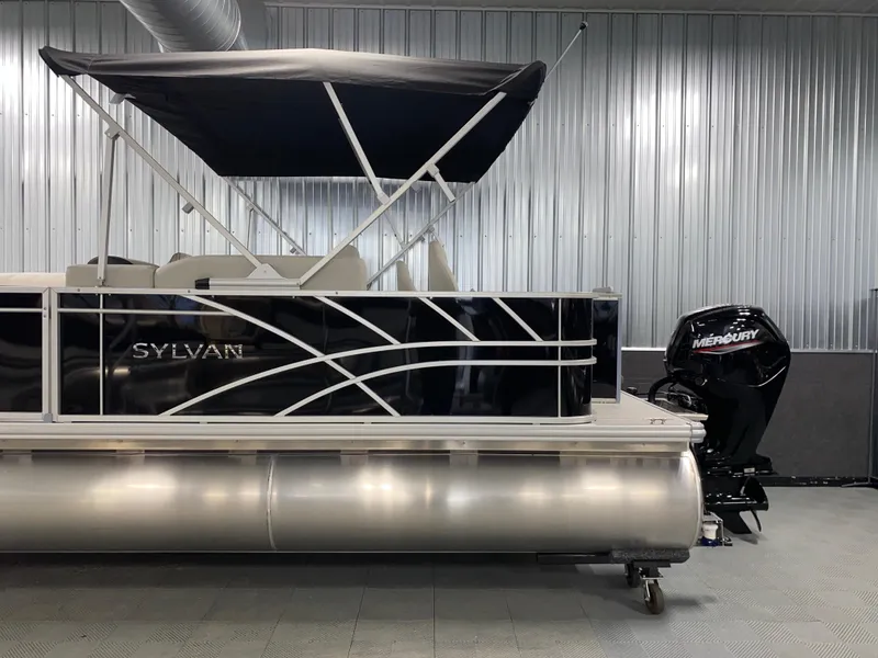 Slide: The Image of 2025 Sylvan Mirage 8520 Party Fish pontoon with Mercury 90HP engine in showroom. - 21