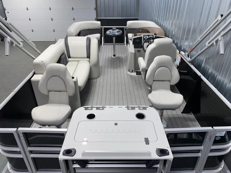 Slide: The Image of 2025 Sylvan Mirage 8520 Party Fish boat interior with plush seating and modern design. - 3