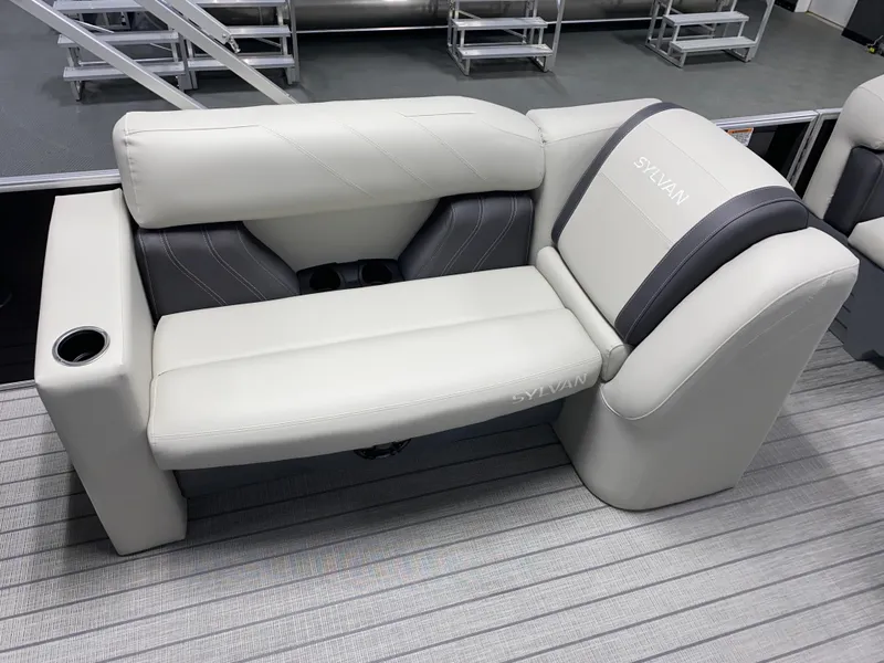 Slide: The Image of 2025 Sylvan Mirage 8520 Party Fish boat seating with cup holder, gray upholstery. - 8