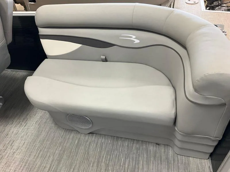 Slide: The Image of 2023 Bennington 21SSR boat seat with gray upholstery and sleek design. - 10