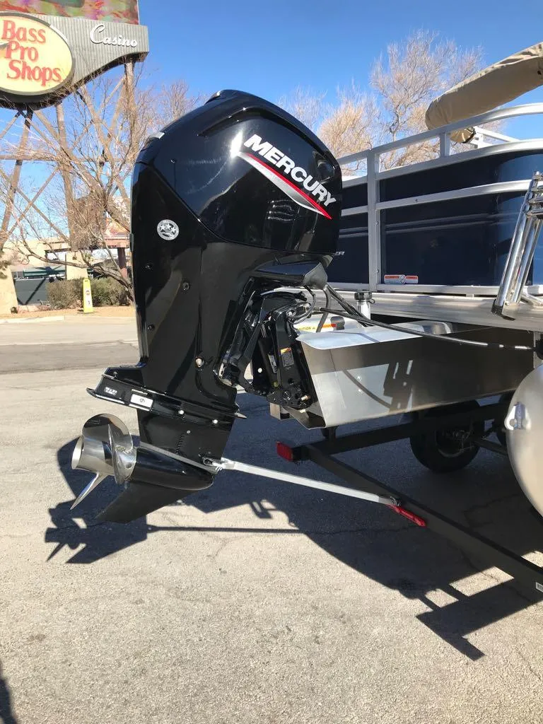Slide: The Image of 2025 Sun Tracker Fishin' Barge 20 DLX with Mercury outboard motor at Bass Pro Shops. - 7
