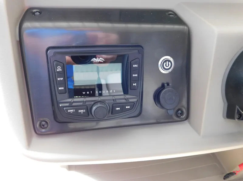 Slide: The Image of Control panel of 2025 Sun Tracker SportFish 20 DLX with audio system. - 19