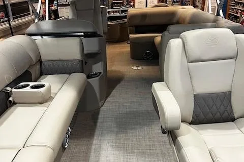 Slide: The Image of 2025 Sun Tracker SportFish 20 DLX interior with luxurious seating and modern design. - 31