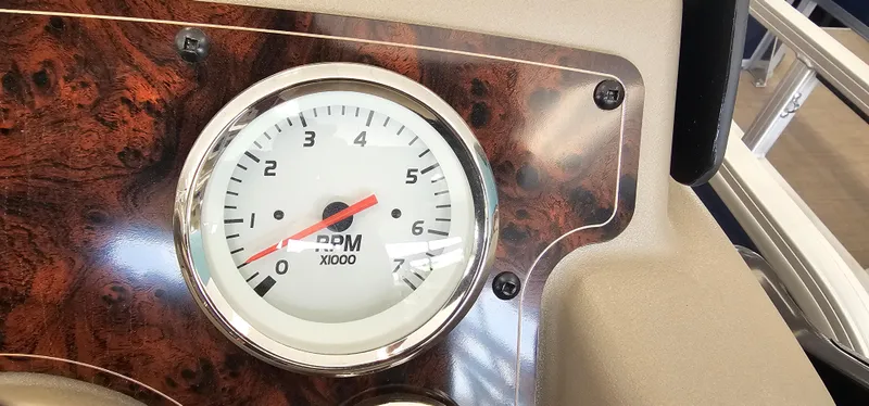 Slide: The Image of Tachometer on 2025 Sun Tracker Bass Buggy 18 DLX dashboard, showing RPM gauge. - 11