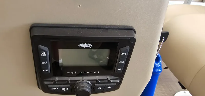 Slide: The Image of Control panel of 2025 Sun Tracker Bass Buggy 18 DLX with Wet Sounds audio system. - 8
