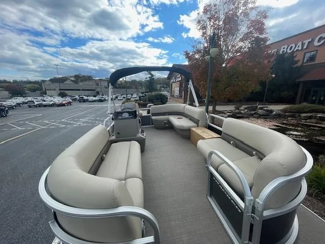 Slide: The Image of 2025 Sun Tracker Party Barge 16 DLX pontoon boat with spacious seating and canopy. - 2