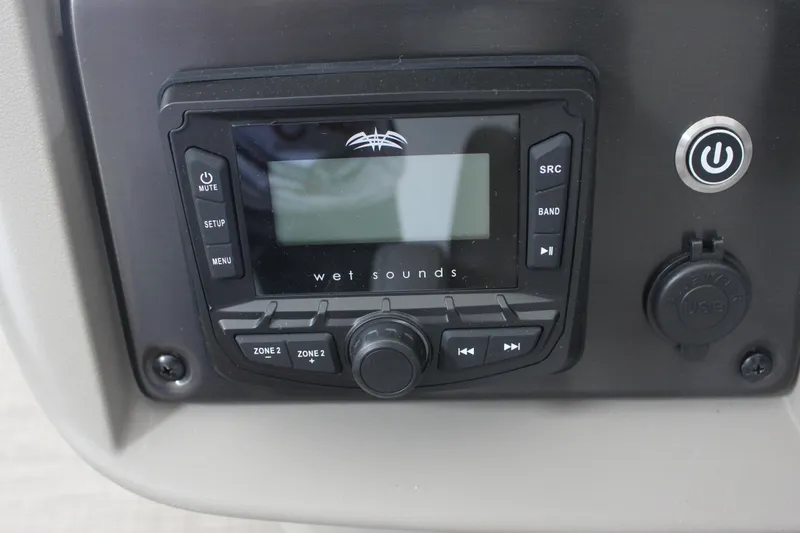 Slide: The Image of Wet Sounds audio system on 2025 Sun Tracker Party Barge 18 DLX boat dashboard. - 6