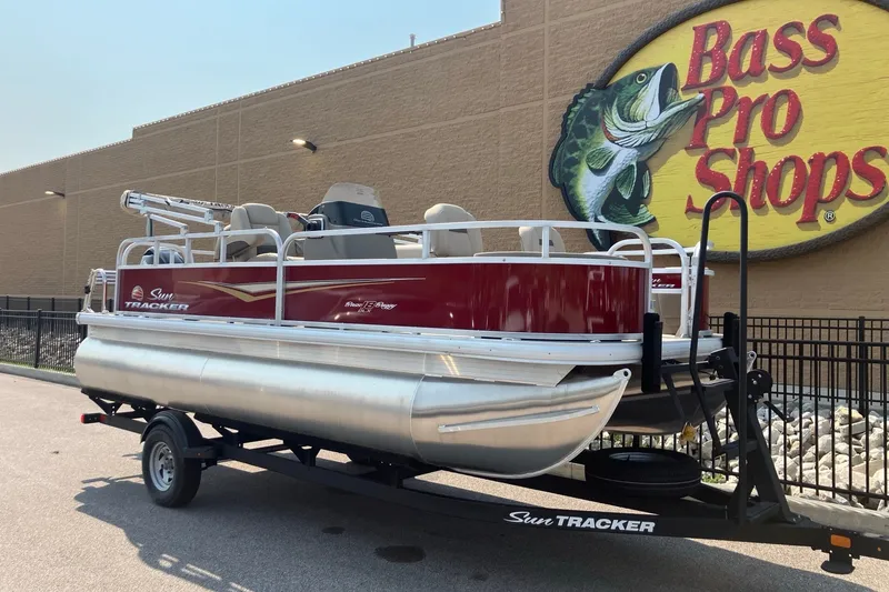 Slide: The Image of 2025 Sun Tracker Bass Buggy 18 DLX pontoon boat at Bass Pro Shops. - 3