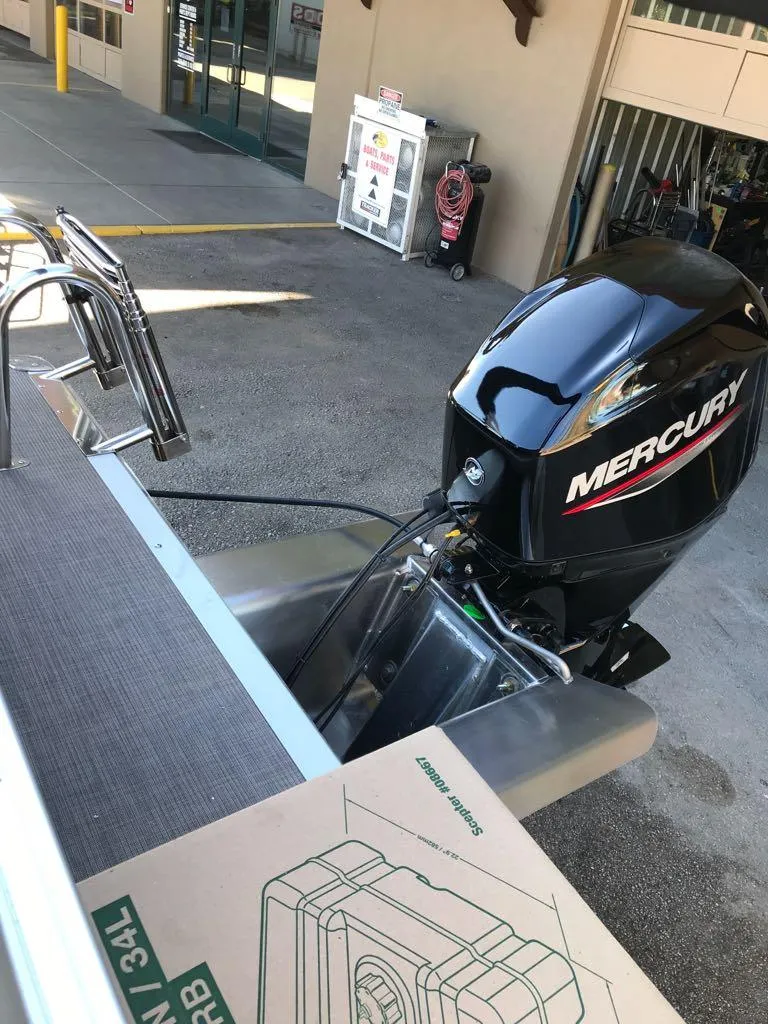 Slide: The Image of 2025 Sun Tracker Party Barge 16 DLX with Mercury outboard motor. - 10