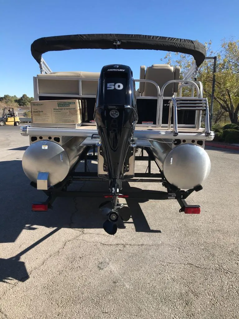 Slide: The Image of 2025 Sun Tracker Party Barge 16 DLX pontoon boat with 50 HP motor. - 4