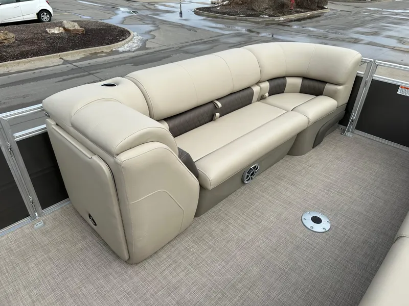 Slide: The Image of 2025 Sun Tracker Party Barge 24 DLX, beige seating, spacious deck, luxurious design. - 4