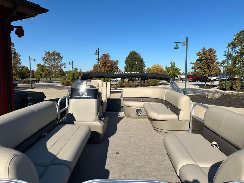 Slide: The Image of 2025 Sun Tracker Party Barge 16 DLX pontoon boat with spacious seating and modern design. - 3