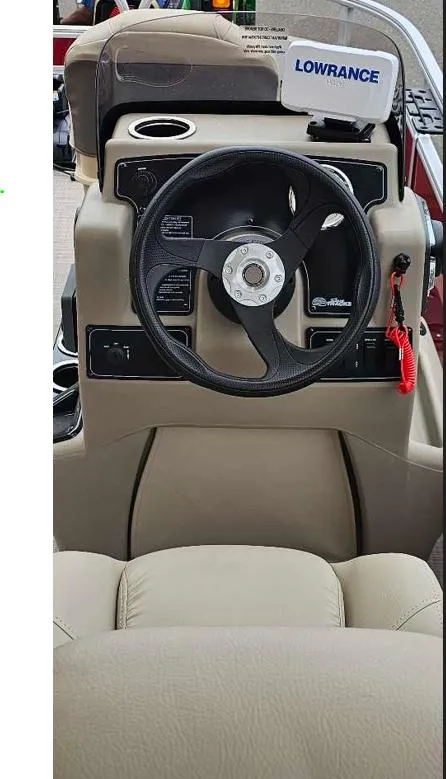 Slide: The Image of 2025 Sun Tracker Bass Buggy 18 DLX steering console with Lowrance system. - 2