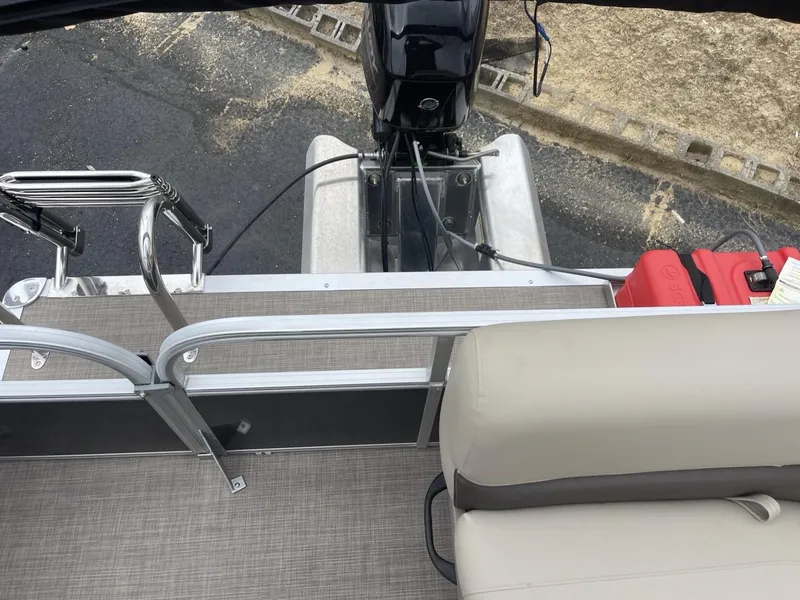 Slide: The Image of 2025 Sun Tracker Party Barge 16 DLX pontoon boat with motor and seating. - 12