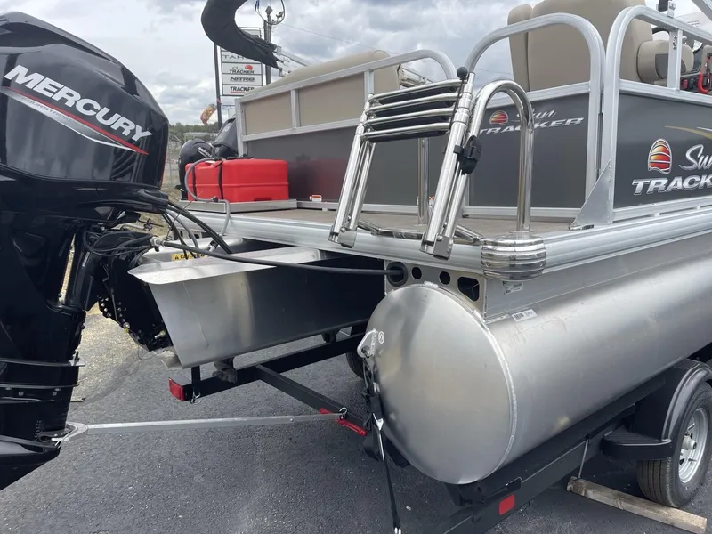 Slide: The Image of 2025 Sun Tracker Party Barge 16 DLX with Mercury engine, rear view. - 6