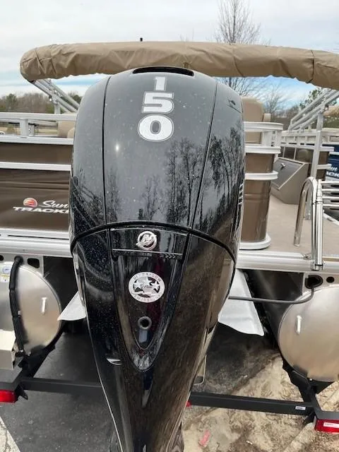 Slide: The Image of 2025 Sun Tracker SportFish 22 DLX with 150 HP outboard motor. - 2