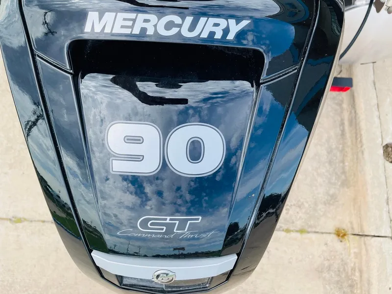 Slide: The Image of Mercury 90 horsepower outboard motor on 2025 Sun Tracker Party Barge 20 DLX. - 34