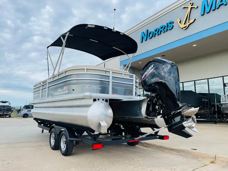 Slide: The Image of 2025 Sun Tracker Party Barge 20 DLX pontoon boat at Norris Marine dealership. - 6
