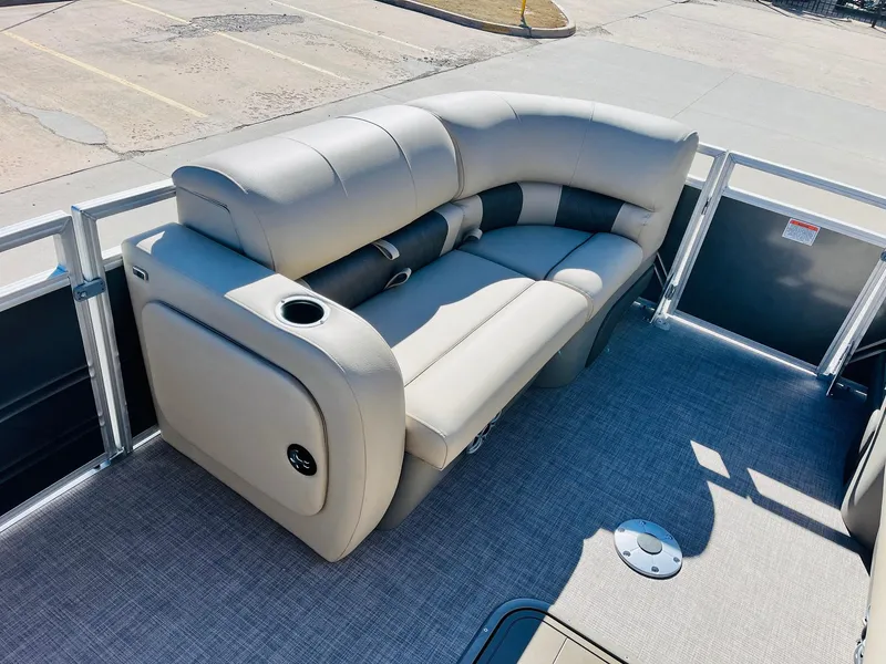 Slide: The Image of 2025 Sun Tracker Party Barge 22 RF XP3 seating area with plush upholstery and cup holders. - 12