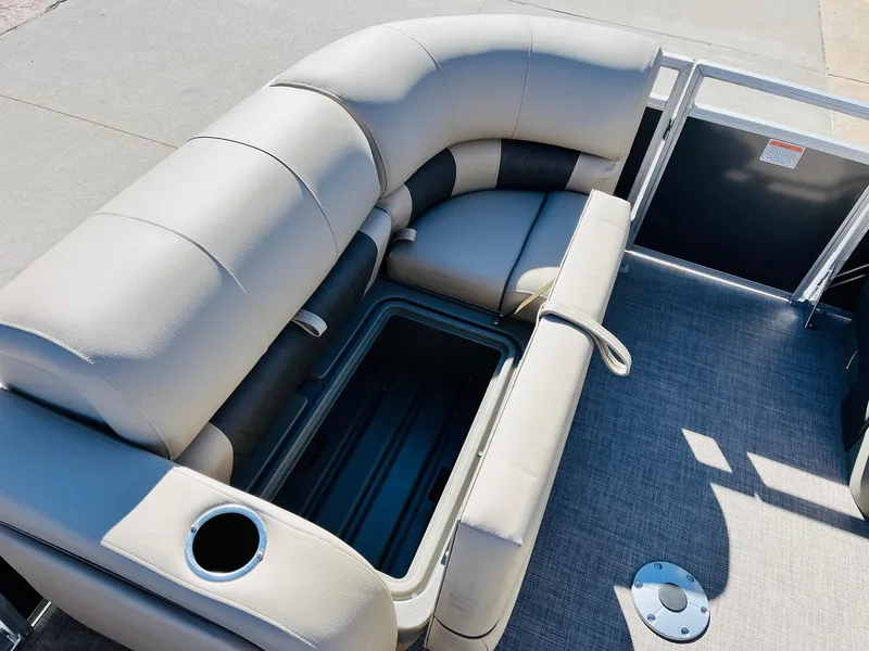 Slide: The Image of 2025 Sun Tracker Party Barge 22 RF XP3 seating area with storage and cup holder. - 15