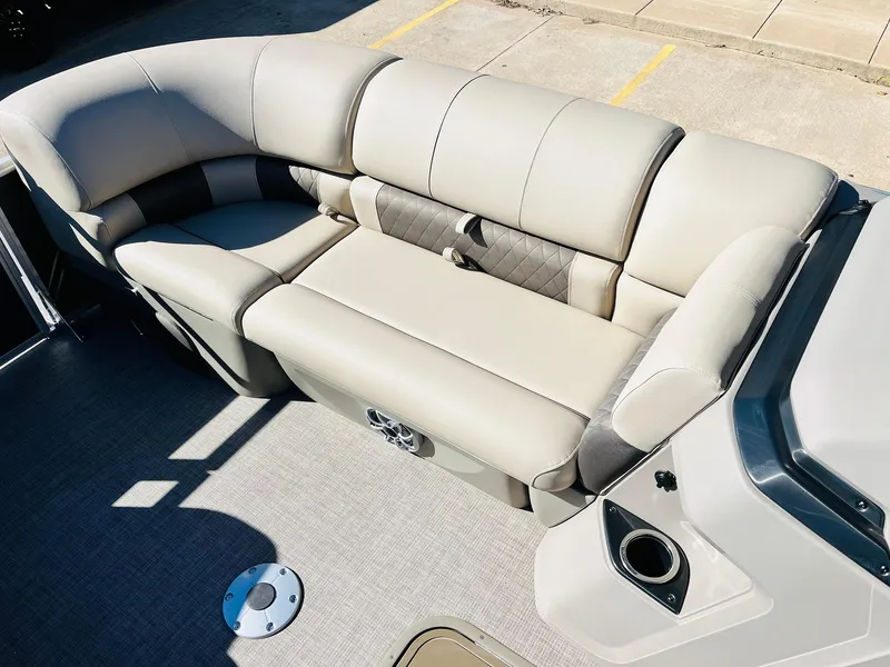 Slide: The Image of 2025 Sun Tracker Party Barge 22 RF XP3, beige seating area, luxurious and spacious design. - 18