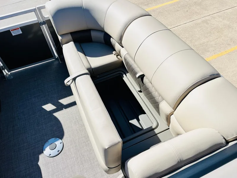 Slide: The Image of 2025 Sun Tracker Party Barge 22 RF XP3 interior seating with storage compartment. - 20
