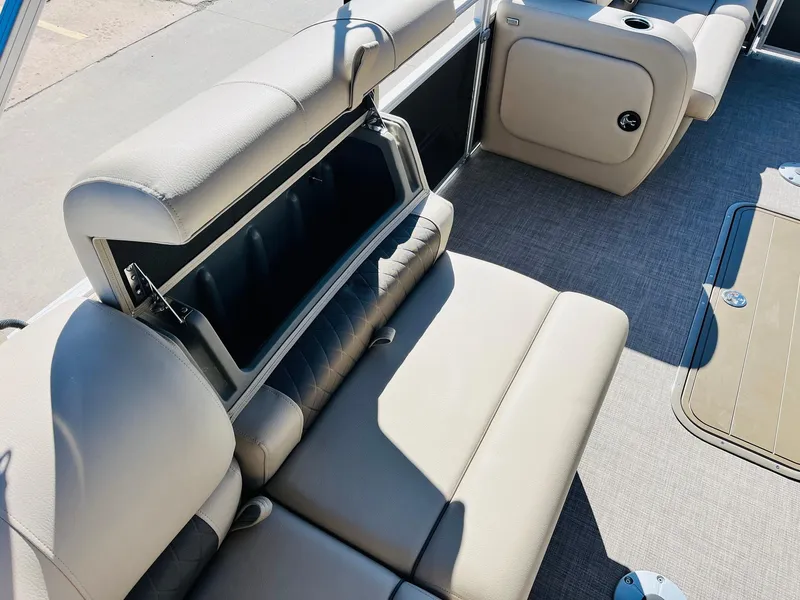 Slide: The Image of 2025 Sun Tracker Party Barge 22 RF XP3 interior seating with storage compartment. - 26