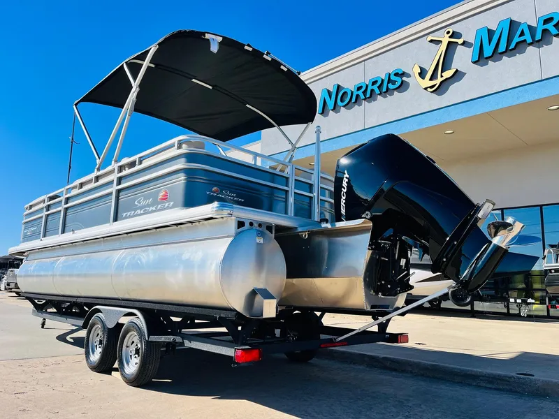 Slide: The Image of 2025 Sun Tracker Party Barge 22 RF XP3 pontoon boat on trailer at Norris Marina. - 7