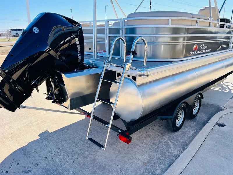 Slide: The Image of 2025 Sun Tracker Party Barge 22 RF XP3 pontoon boat with Mercury engine and trailer. - 8